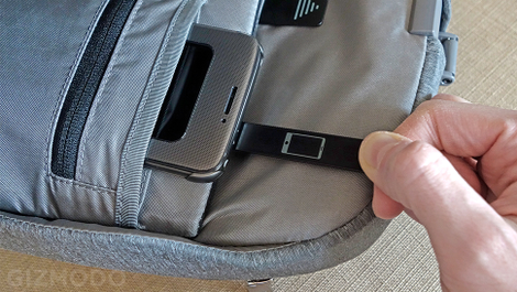 Retrieving your phone is as easy as pulling on a strap.